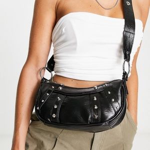 ASOS DESIGN curved crossbody bag with studding in black